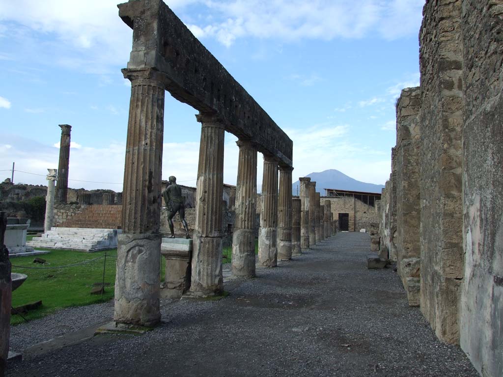 VII.7.32 Pompeii. December 2006. Looking north along east side of Temple of Apollo.