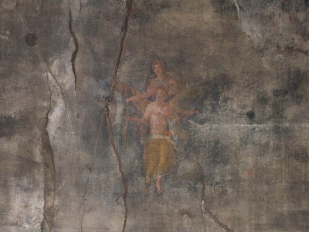 VII.9.7 and VII.9.8 Pompeii. Macellum. September 2005. North west corner. Painting of two figures one with wings.