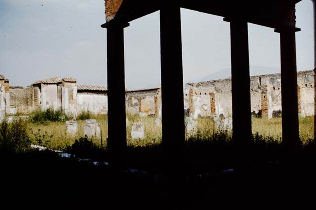 VII.9.7 and VII.9.8 Macellum. Pompeii. 1961. Looking south-east across Macellum. Photo by Stanley A. Jashemski.
Source: The Wilhelmina and Stanley A. Jashemski archive in the University of Maryland Library, Special Collections (See collection page) and made available under the Creative Commons Attribution-Non Commercial License v.4. See Licence and use details. 
J61f0651
