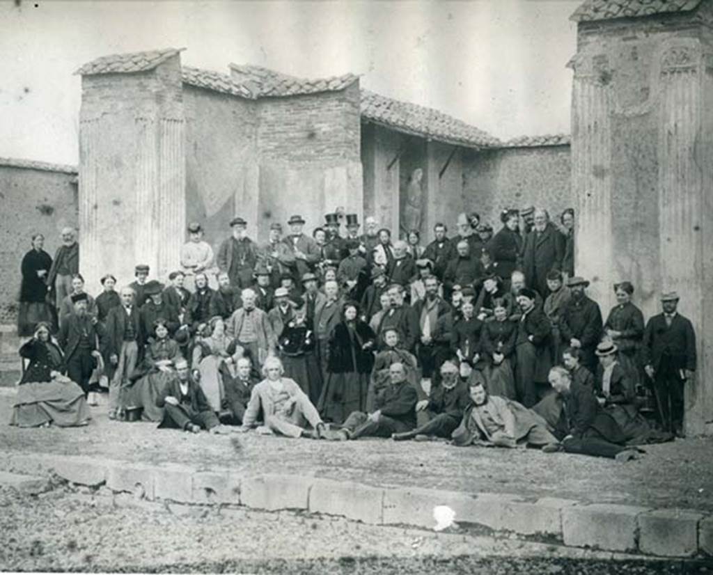 VII.9.7 and VII.9.8 Pompeii. Macellum. Thomas Cook’s party in 1868 in front of the shrine.
Thomas Cook himself sits upright in the centre of the front row, fourth from the right.
Photo courtesy of Rick Bauer.
Our thanks to Paul Smith, Company Archivist at Thomas Cook UK & Ireland, for his assistance with this.
The original photo is in the Thomas Cook Archives now held in the Record Office for Leicestershire, Leicester and Rutland.