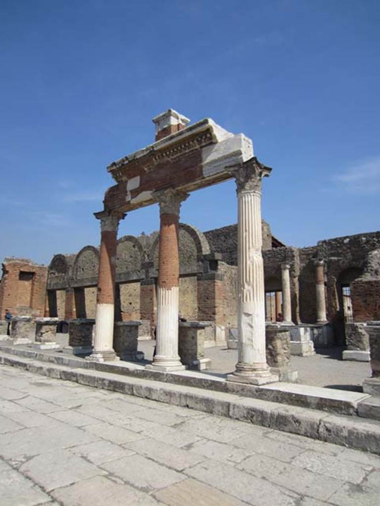 VII.9.8 and VII.9.7 Pompeii. March 2012. Entrances (on right) in north-east corner of Forum. Photo courtesy of Marina Fuxa.
