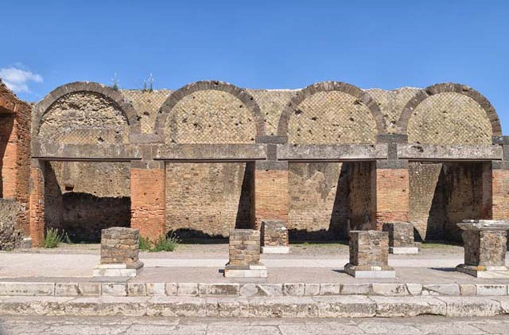 VII.9.12 Pompeii, on left. April 2018. Looking east towards exterior facades of shops at VII.9.12/11/10 and 9. Photo courtesy of Ian Lycett-King. Use is subject to Creative Commons Attribution-NonCommercial License v.4 International.
