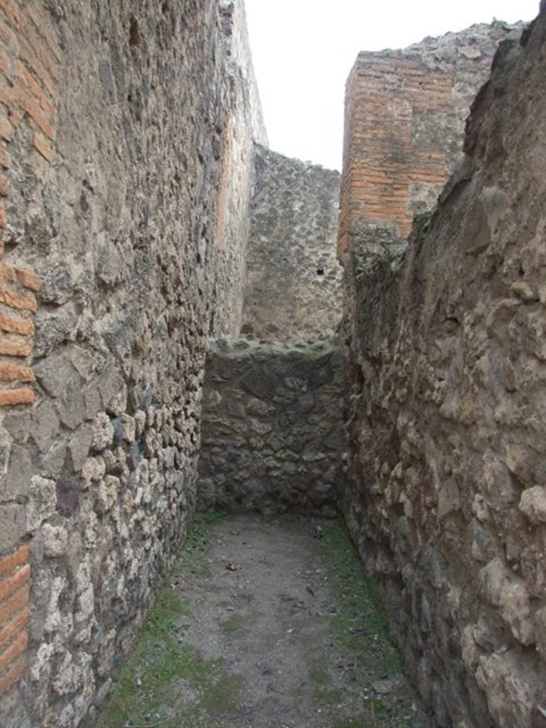 VII.9.13 Pompeii. December 2007. Site of steps to upper floor.  
Della Corte surmised that these steps led to the rooms of the society of makers and sellers of unguents and perfumes. Found on the wall at the side of the stairs was CIL IV 609 in support of the candidate Verus � 
Unguentari facite rog(amus)  Another electoral recommendation that he could read, he published for the first time �
Modestum Aed
(Unguen)tari et Pauper(es) facite
See Della Corte, M., 1965.  Case ed Abitanti di Pompei. Napoli: Fausto Fiorentino. (p.181)
According to Epigraphik-Datenbank Clauss/Slaby (See www.manfredclauss.de) these read �
[CIL IV 609]
