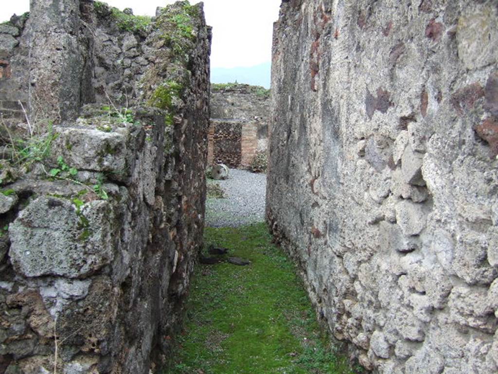 VII.9.47 Pompeii. December 2005. Room 13. Corridor, looking south to Peristyle area.