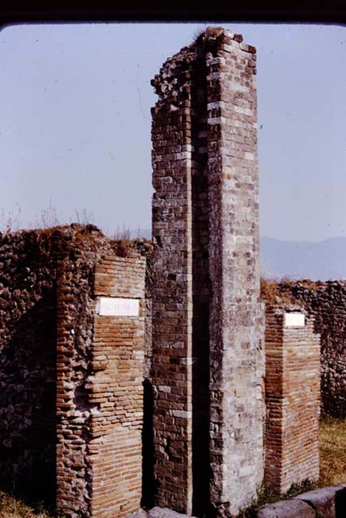 VII.10.7 Pompeii. 1980. Looking south-east towards water castle/tower on east side of Vicolo di Eumachia. Photo by Stanley A. Jashemski.
Source: The Wilhelmina and Stanley A. Jashemski archive in the University of Maryland Library, Special Collections (See collection page) and made available under the Creative Commons Attribution-Non Commercial License v.4. See Licence and use details. J80f0219