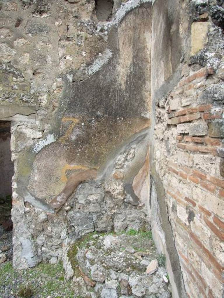 VII.10.9 Pompeii. March 2009. Remains of plaster in north west corner of atrium.
