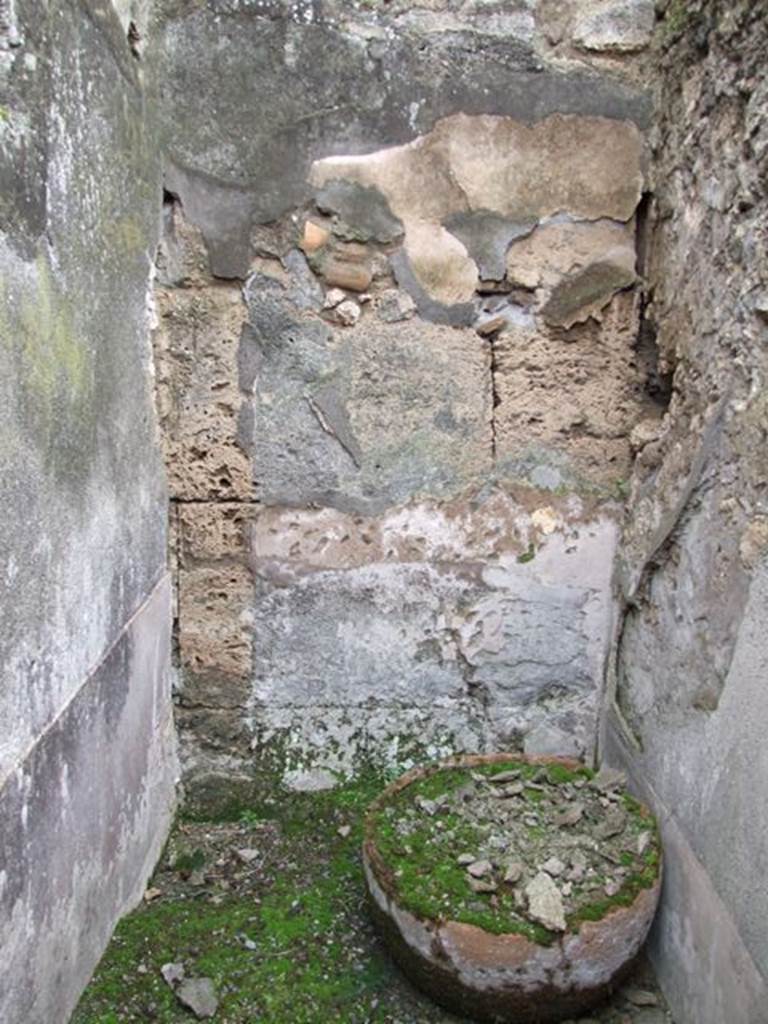 VII.10.9 Pompeii. March 2009. Small room or storeroom on west side of corridor. West wall.