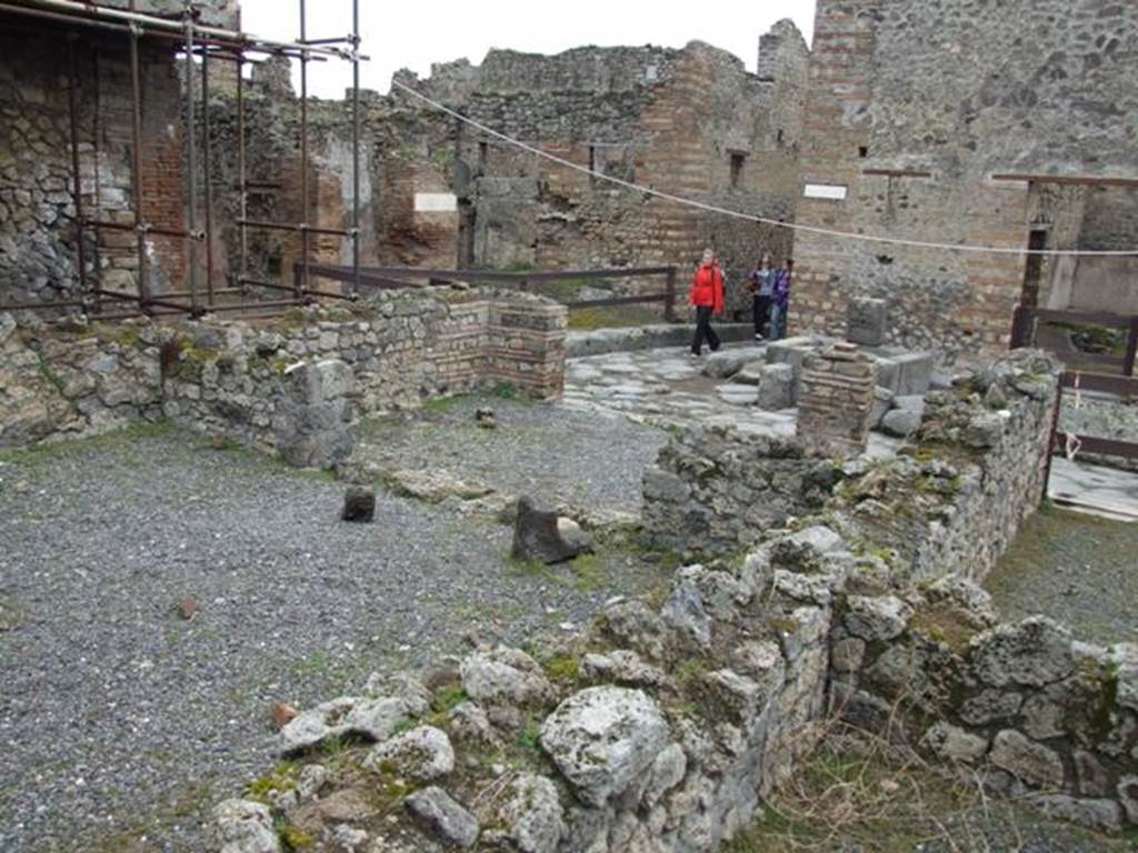 VII.10.10 Pompeii. March 2009. Looking east towards front room of shop.