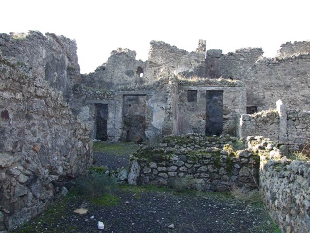 VII.10.12 Pompeii. December 2007. Looking across shop to atrium of dwelling.