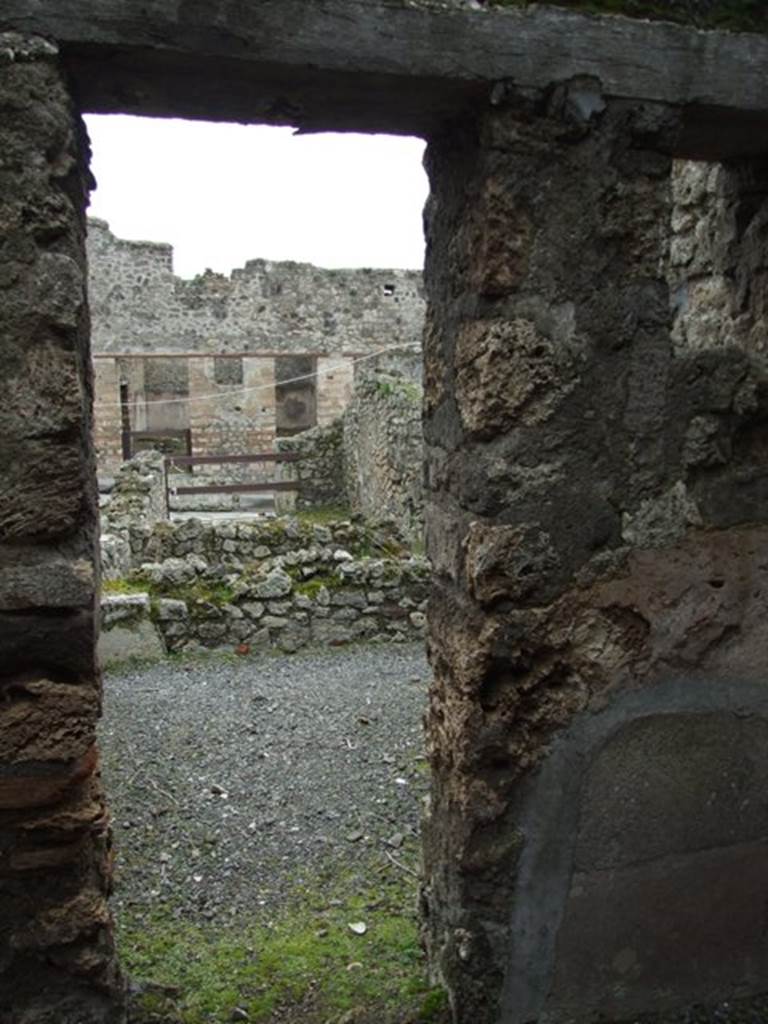 VII.10.12 Pompeii. March 2009. Looking east from corridor into room on north side of atrium.