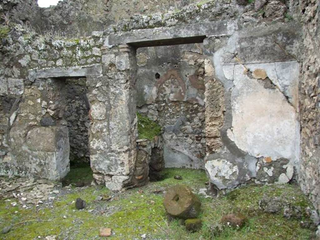 VII.10.12 Pompeii. March 2009. West side of atrium, with doorways to Latrine and Kitchen (VII.10.9)