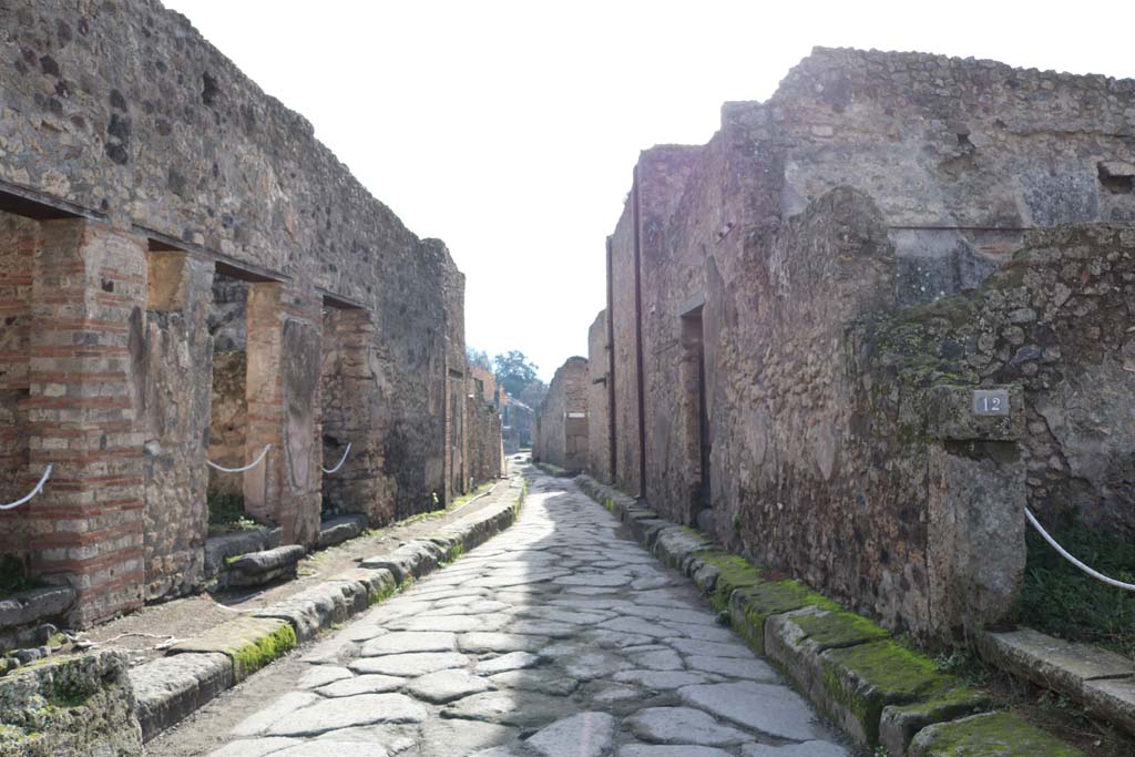 VII.10.12, Pompeii, on right. December 2018.
Looking south on Vicolo della Maschera between VII,11, on left, and VII.10.12, on right. Photo courtesy of Aude Durand.