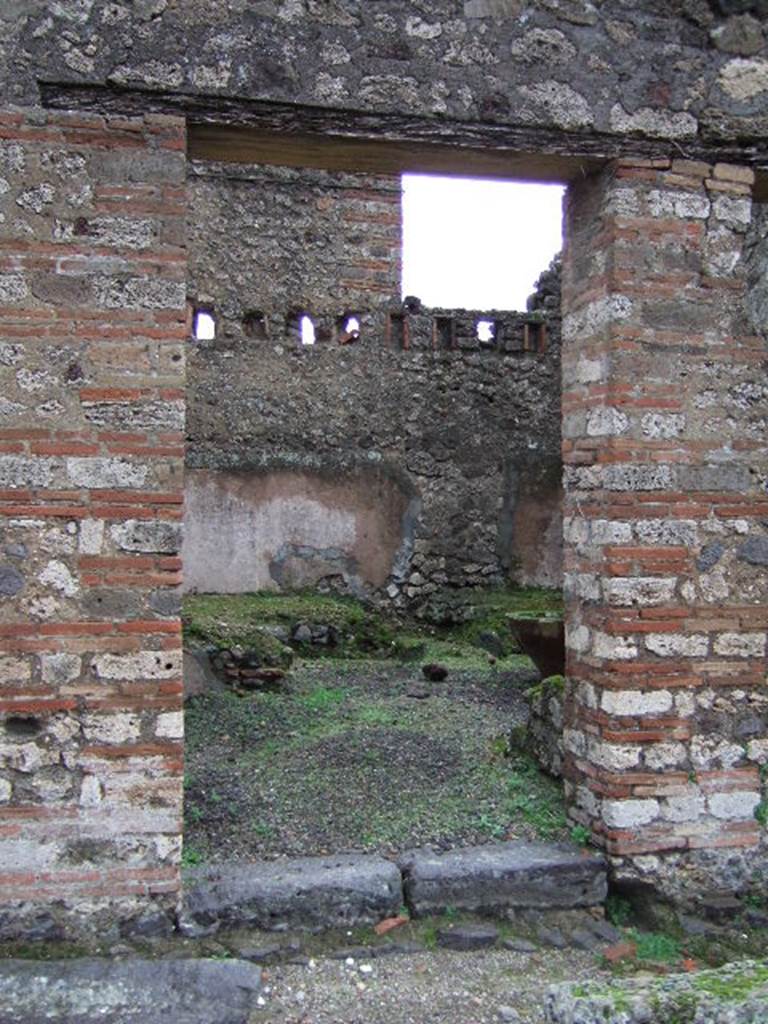 VII.11.5 Pompeii. December 2005. Entrance doorway, looking east.