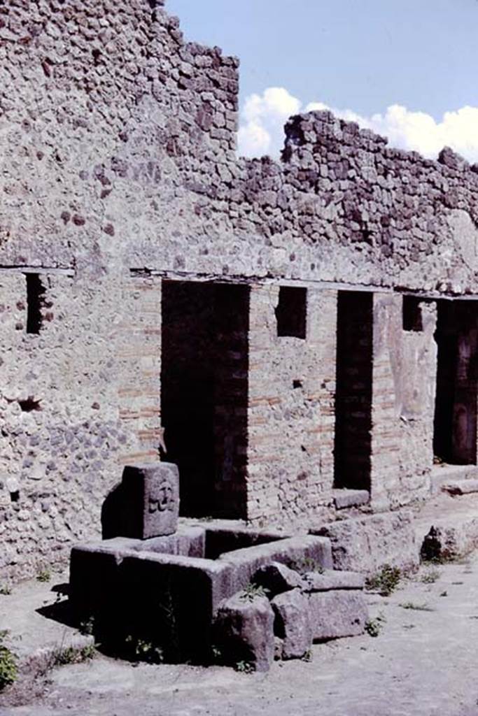 VII.11.5 Pompeii. 1966. Entrance doorway near fountain, with VII.11.4, and VII.11.3, on the right. Photo by Stanley A. Jashemski.
Source: The Wilhelmina and Stanley A. Jashemski archive in the University of Maryland Library, Special Collections (See collection page) and made available under the Creative Commons Attribution-Non Commercial License v.4. See Licence and use details.
J66f0586