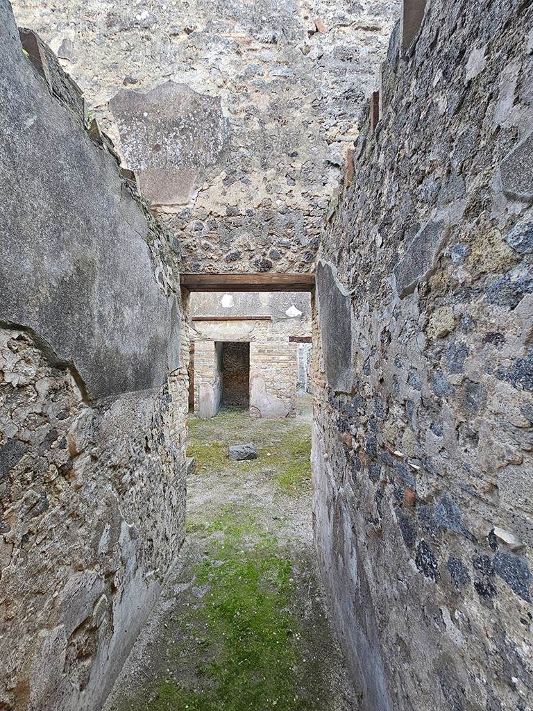 VII.11.11 Pompeii. November 2024.
Looking south along entrance corridor towards atrium. Photo courtesy of Annette Haug.