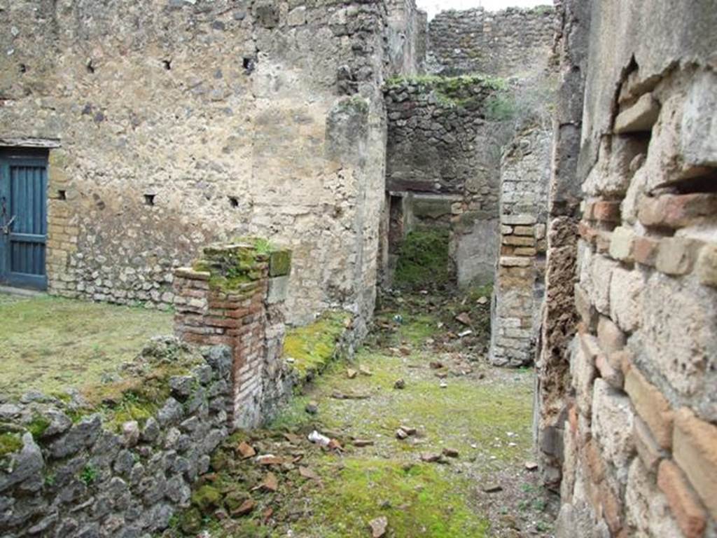 VII.11.14 Pompeii. March 2009. Room 1. Passageway, looking towards West wall of Garden area “A” and Rooms 5 and 6.