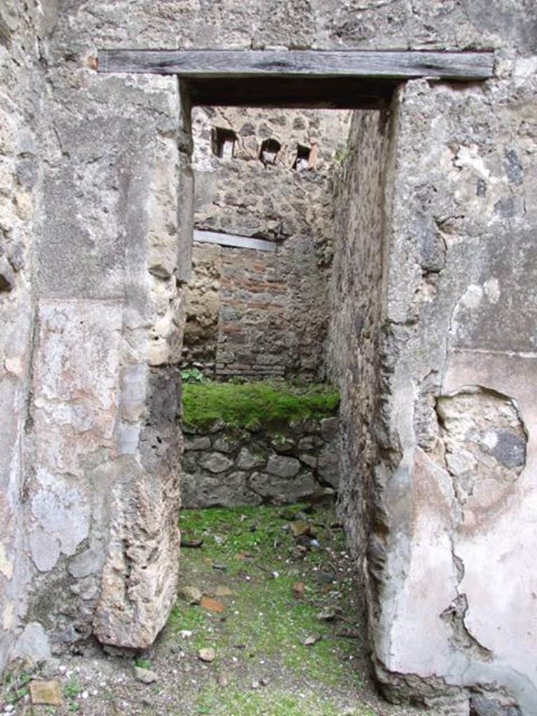 VII.11.14 Pompeii. March 2009. Room 11. Entrance to kitchen.