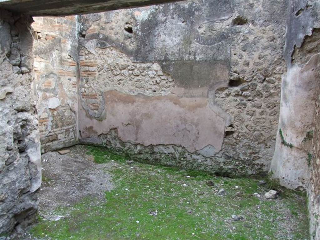 VII.11.15 Pompeii. December 2006. Side room to left of entrance, looking south. According to Eschebach, in the south-west corner was the latrine and a down-pipe from above. Site of latrine and waste pipe from upper floor on right of picture.