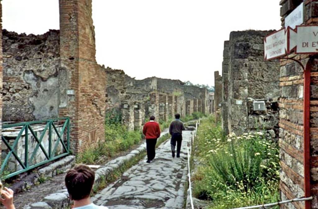 VII.2, Pompeii, on left. 1989. Looking east on Via degli Augustali, from outside of VII.12.1, on right. Photo courtesy of Anne Fettis.