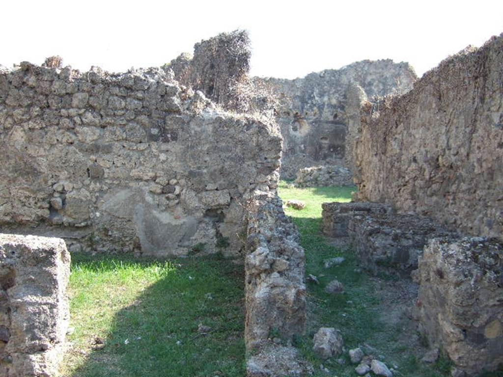 VII.12.13 Pompeii. September 2005. Rear room of shop and corridor to bakery area.