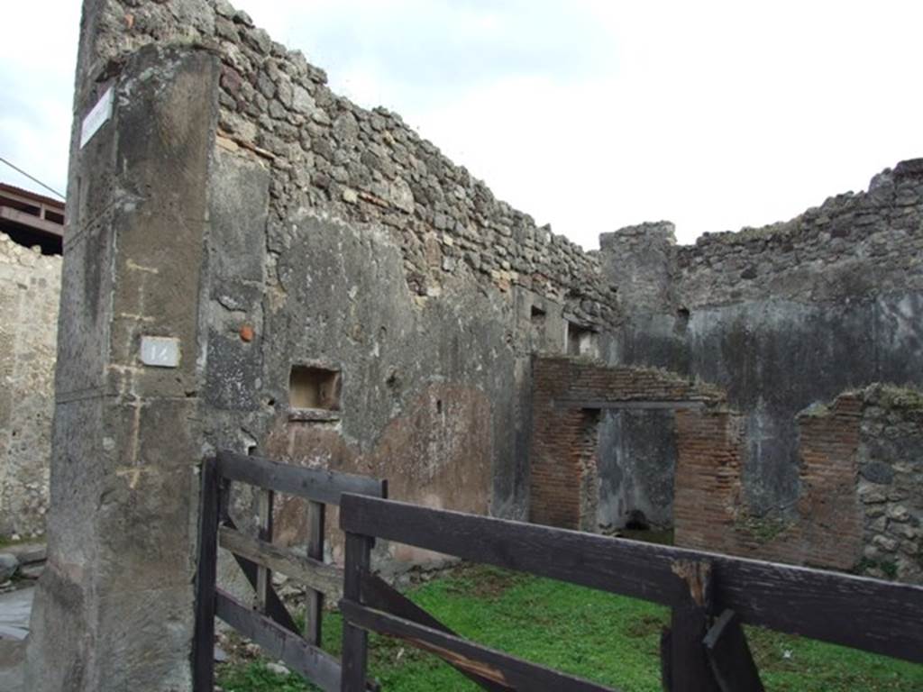 VII.12.14 Pompeii. December 2007. East wall with niche. According to Boyce, in the east wall of the shop-room was a rectangular niche. Its inside walls were coated with orange-coloured stucco. See Boyce G. K., 1937. Corpus of the Lararia of Pompeii. Rome: MAAR 14. (p.71, no.319)