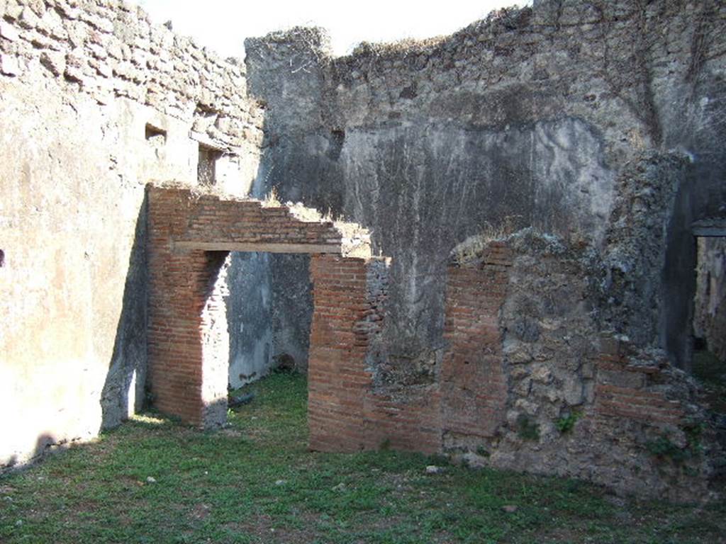 VII.12.14 Pompeii. September 2005. Room in south east corner of shop, with three windows.