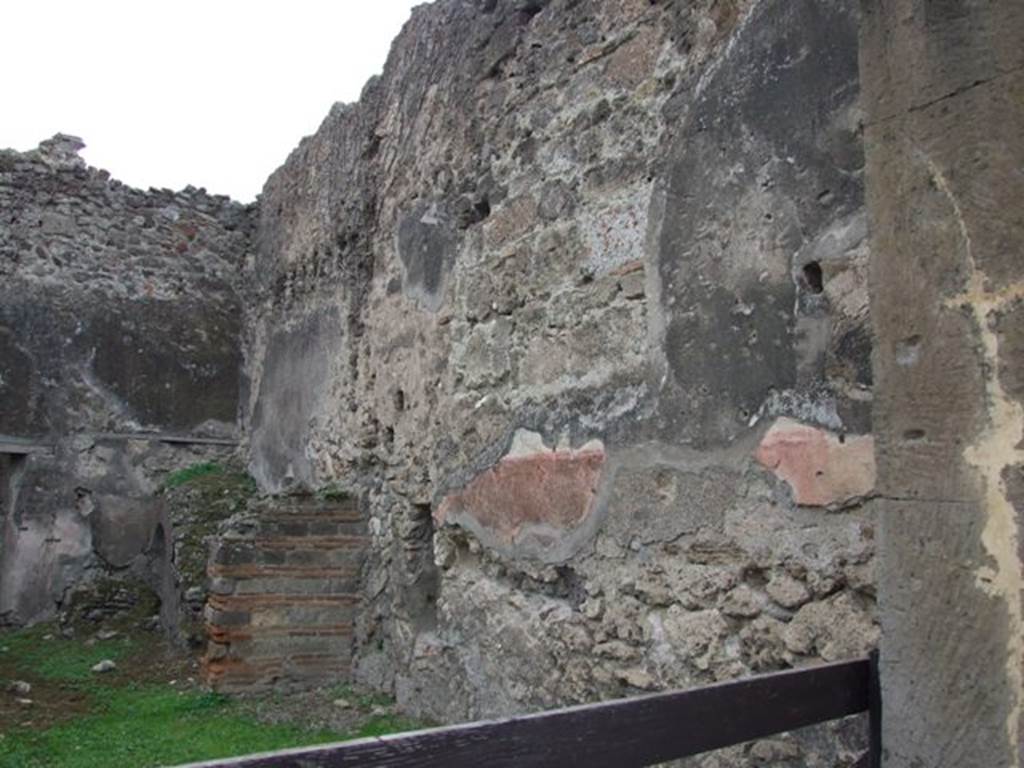 VII.12.14 Pompeii. December 2007. West wall, with remains of staircase at rear.
