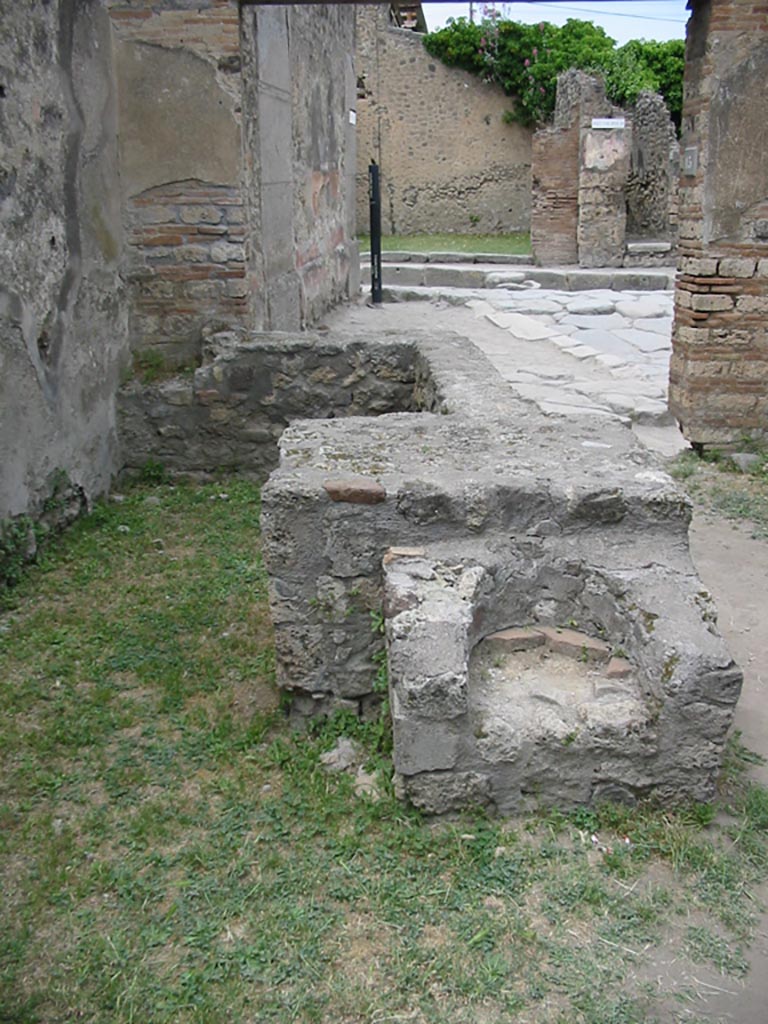 VII.12.15 Pompeii. May 2003.
Looking north from rear of counter and hearth, towards Via degli Augustali. Photo courtesy of Nicolas Monteix.