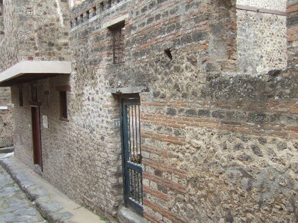 VII.12.18 and VII.12.17 Pompeii. May 2006.
Entrances on Vicolo del Lupanare. Looking south-east.