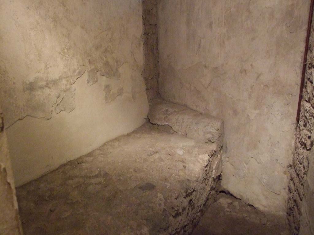 VII.12.18 Pompeii. December 2006. Prostitutes room with stone bed.