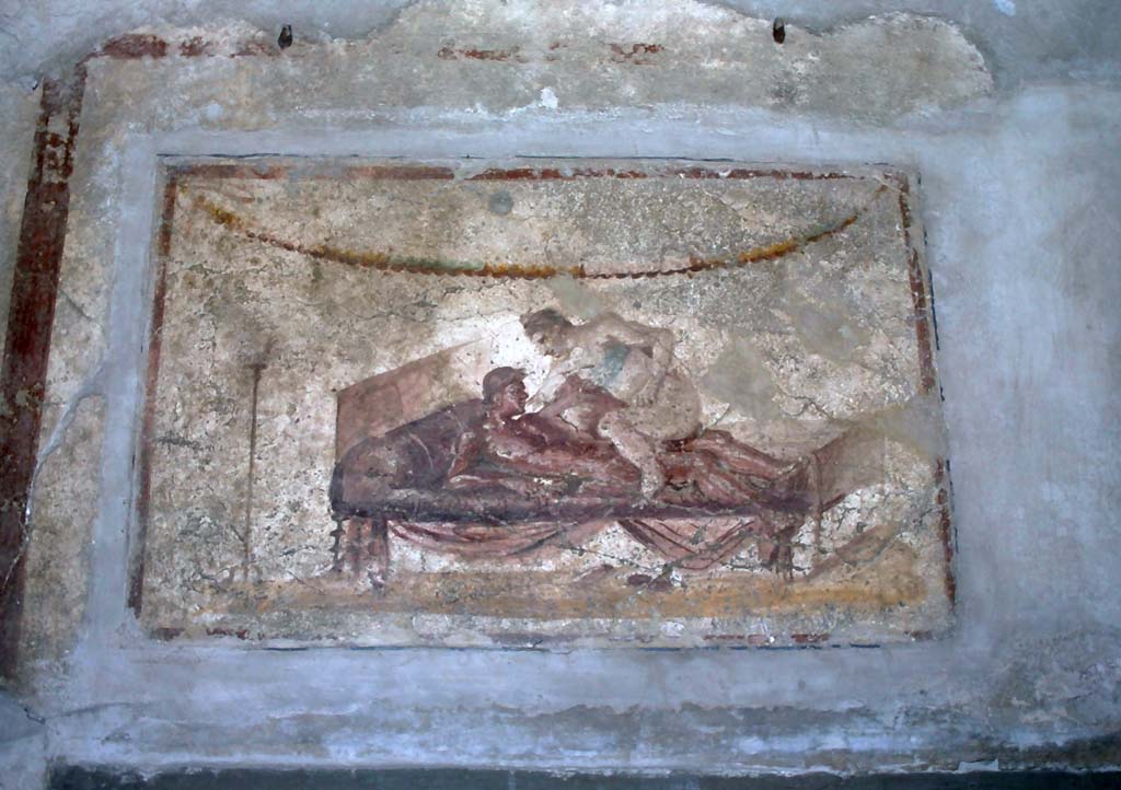 VII.12.18 Pompeii. July 1980. Erotic painting on frieze. Photo courtesy of Rick Bauer, from Dr George Fay’s slides collection.