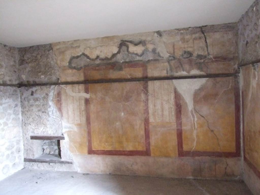 VII.12.20 Pompeii. March 2009. Room 4. North wall with painted plaster decoration.
