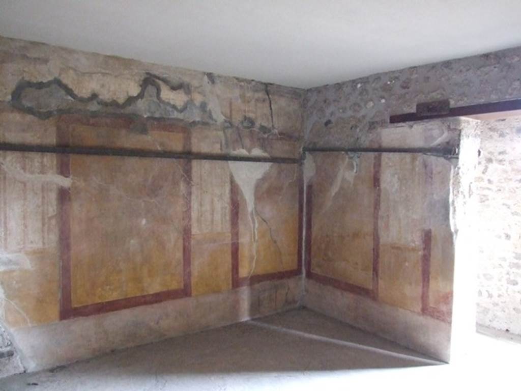 VII.12.20 Pompeii. March 2009. Room 4. North east corner with painted plaster decoration.