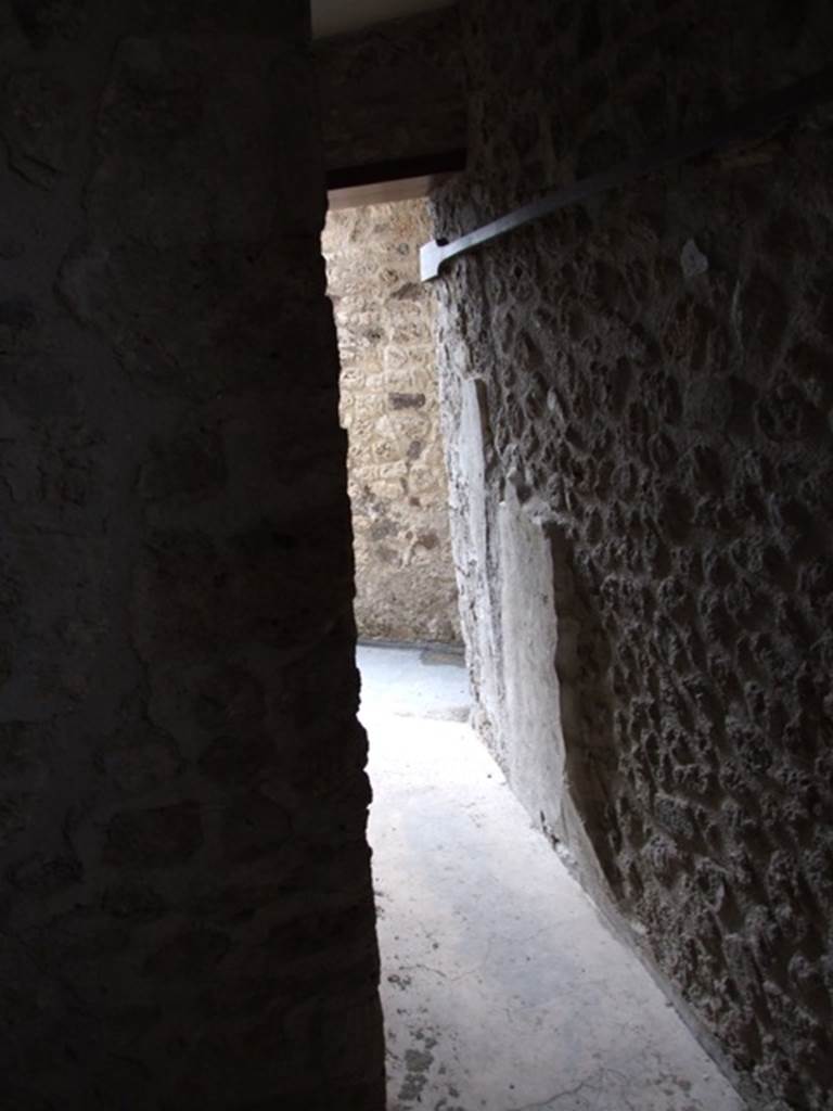 VII.12.20 Pompeii. March 2009. Doorway out of Room 5.