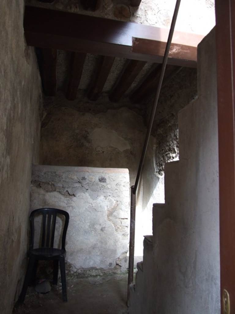 VII.12.20 Pompeii. March 2009. Entrance corridor, leading to latrine and staircase, originally made of wood. See Pappalardo, U., 2001. La Descrizione di Pompei per Giuseppe Fiorelli (1875). Napoli: Massa Editore. (p.112)