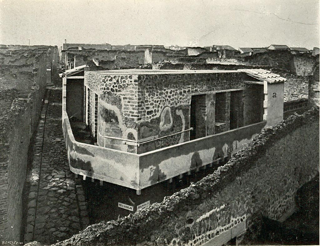 VII.12.20 Pompeii. c.1908-1909. Looking west towards upper floor balcony/corridor around the edges of the doorways to rooms.
The doorways and window of rooms 3 and 4 can be seen, centre right, overlooking Vicolo del Lupanare.
The other doorways overlooking Vicolo del Balcone Pensile are on the left.
According to Sogliano –
“As for the balcony, I had only its two ends reconstructed (fig. I, a, a), because the height of these was marked with certainty by the traces of ancient plaster on the outside of the walls. I did not close the remaining part of the balcony, because, although there was no longer any doubt as to its height, the number and position of the windows that were to illuminate it remained uncertain, especially as the communication doorways between the balcony itself and the chambers, due to the singular distribution given to the rooms, do not keep a regular distance between them, and are seen very close together towards the ends, leaving a large section of wall towards the middle with no openings at all. Given this configuration, various hypotheses are equally possible, but two are enough to make the restoration uncertain. In such uncertainty, I have limited the restoration to just the two ends, which I have had covered with tiles of a similar size to the ancient ones, which seen from below appear to be the protruding part of the roof that was meant to cover the entire building.”
See Sogliano, A., 1909. Dei lavori eseguiti in Pompei dal i Luglio 1908 a tutto Giugno 1909, p. 14-15, fig 1.