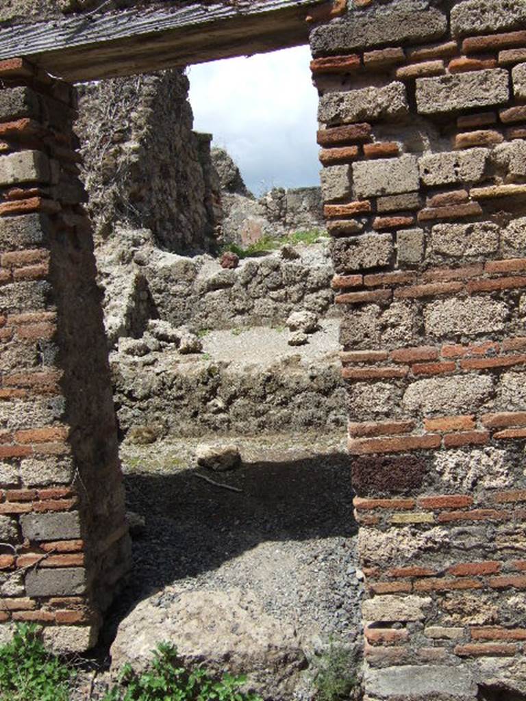 VII.12.33 Cella meretricia under
steps to upper floor from VII.12.32