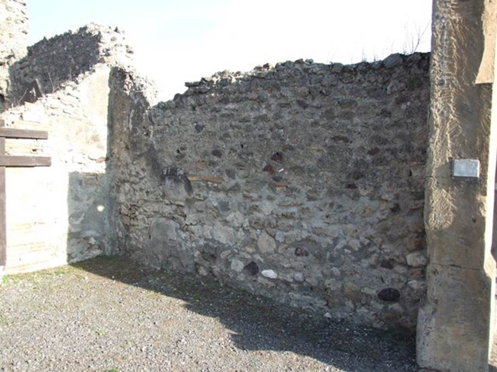 VII.13.1 Pompeii. Shop. East wall.