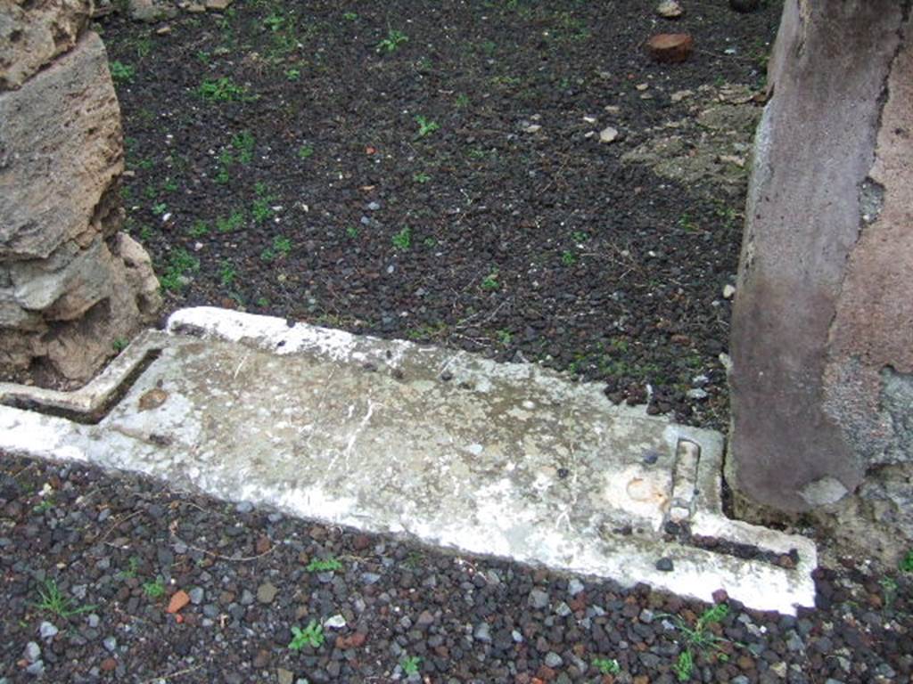 VII.13.8 Pompeii. December 2005. Marble threshold or sill to cubiculum on east of atrium.