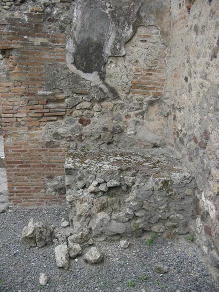 VII.13.20 Pompeii. May 2003. Another hearth or oven on the north side of doorway.
Photo courtesy of Nicolas Monteix.