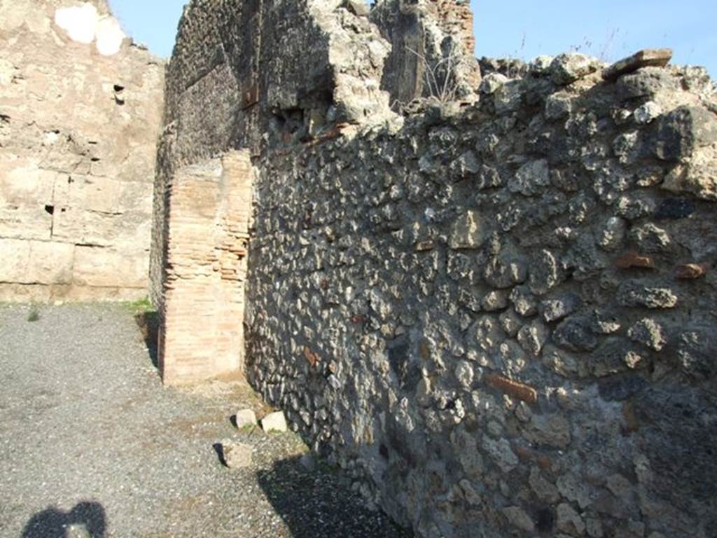 VII.14.3 Pompeii. May 2005. East wall of shop.