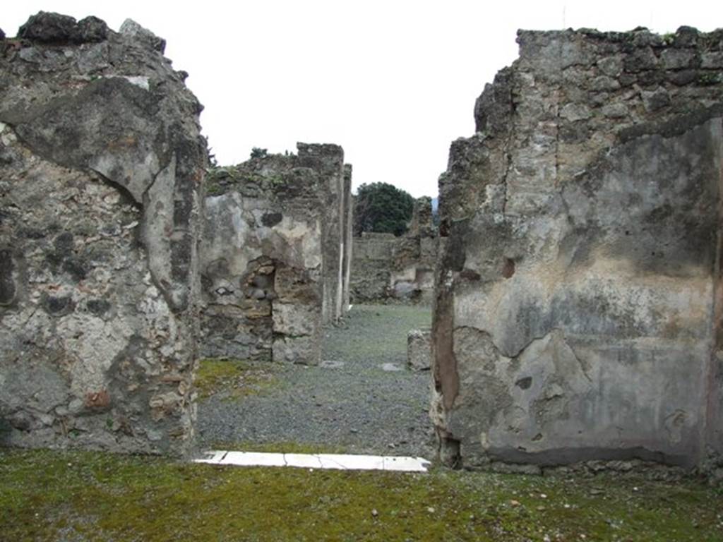 VII.14.5 Pompeii. March 2009. Room 10. Looking south through doorway into South Portico.