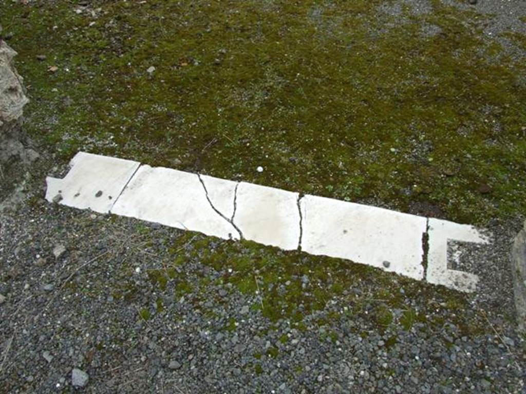 VII.14.5 Pompeii. March 2009. Room 10. Door sill.