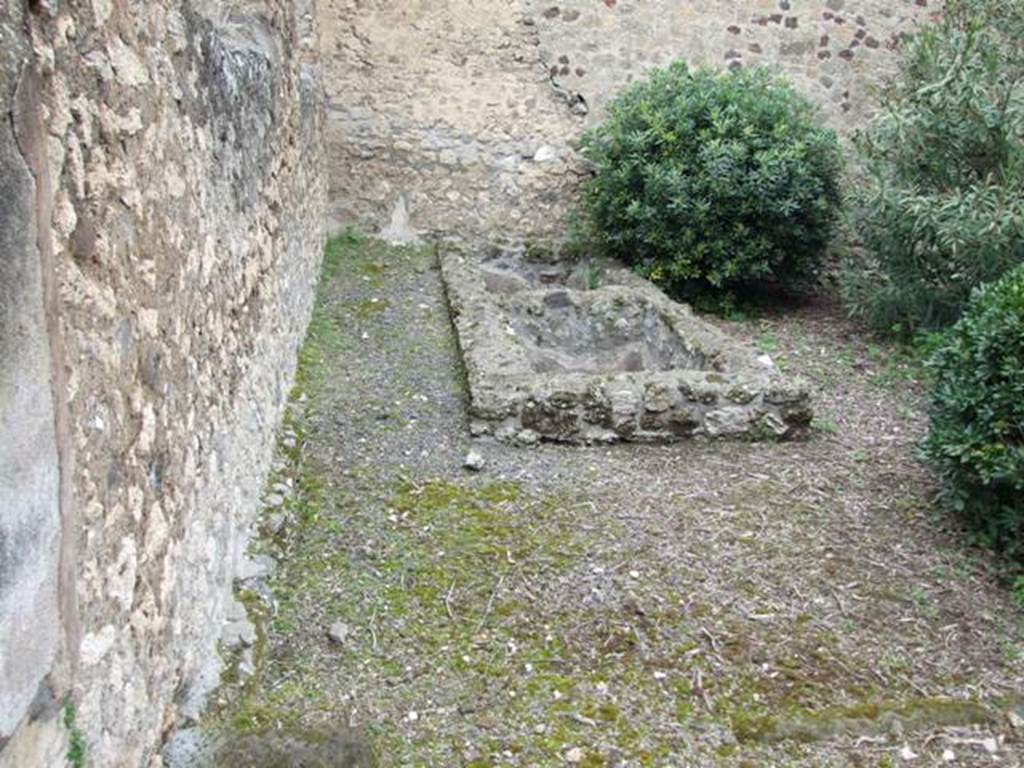 VII.14.5 Pompeii. March 2009. Room 11, two basins at west end of peristyle garden area. According to Jashemski, two basins at the west end of the garden collected rain water from the neighbouring roofs. This was for use in the dye-house installed in the area adjacent to the garden on the west. The garden, which may have been used for drying the dyed fabric, had a hunt scene which was badly damaged at the time of excavation.
See Jashemski, W. F., 1993. The Gardens of Pompeii, Volume II: Appendices. New York: Caratzas. (p.198)