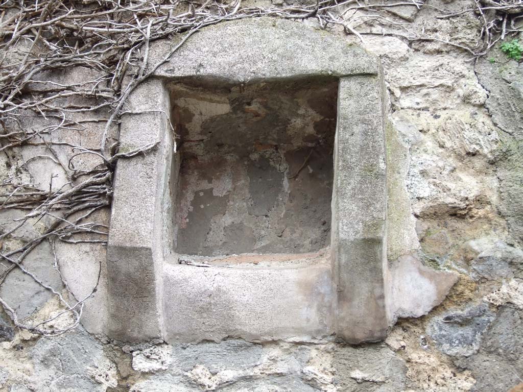 VII.14.5 Pompeii. March 2009. Room 18, niche in south wall of kitchen.
According to Boyce, in the large kitchen entered from the posticum at VII.14.19, high up on the south wall, was a square niche.
According to Fiorelli, this was “la piccola nicchia dei Penati”.
Boyce gave the reference - Fiorelli, Descr., 302.
See Boyce G. K., 1937. Corpus of the Lararia of Pompeii. Rome: MAAR 14. (p.71, no.327)
See Giacobello, F., 2008. Larari Pompeiani: Iconografia e culto dei Lari in ambito domestico. Milano: LED Edizioni, (p.195, no.81)