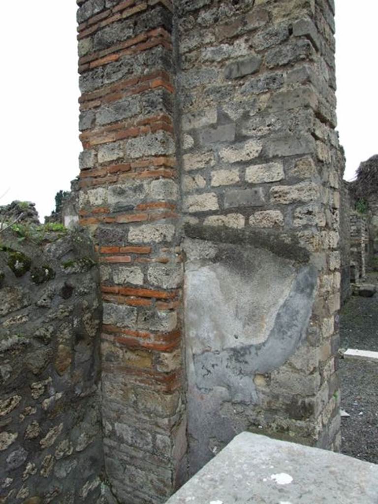 VII.14.5 Pompeii. March 2009. Room 21. Pillar with plaster.