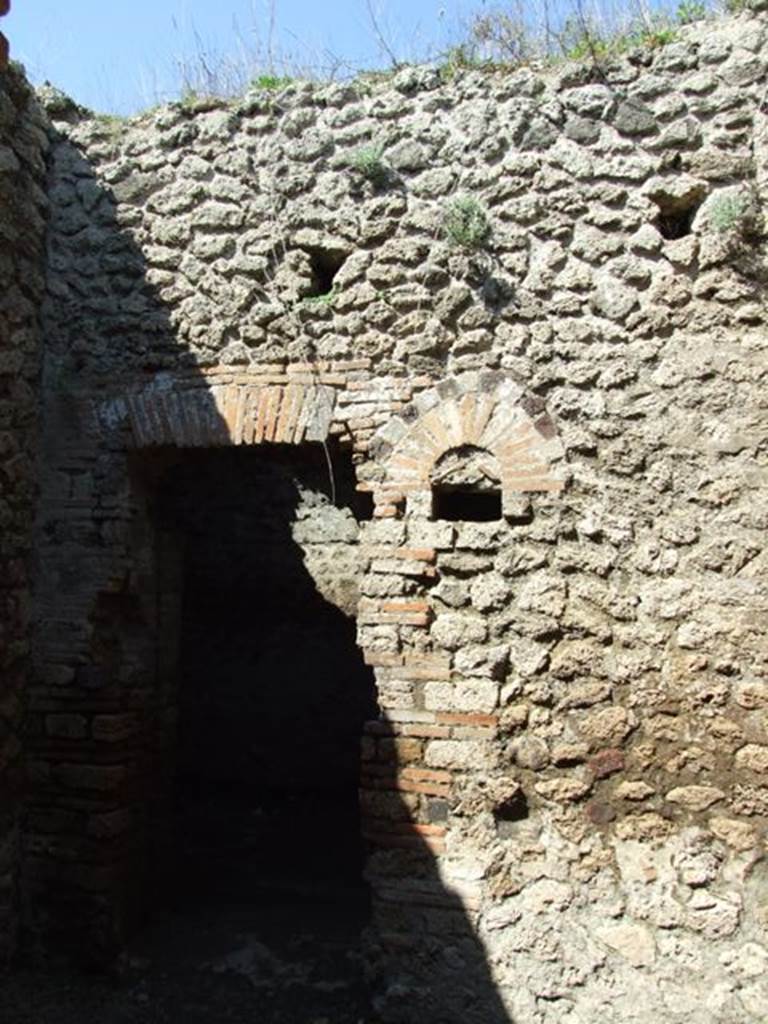 VII.14.9 Pompeii. March 2009. Room 9, north wall of bath suite, with doorway to room 10.
