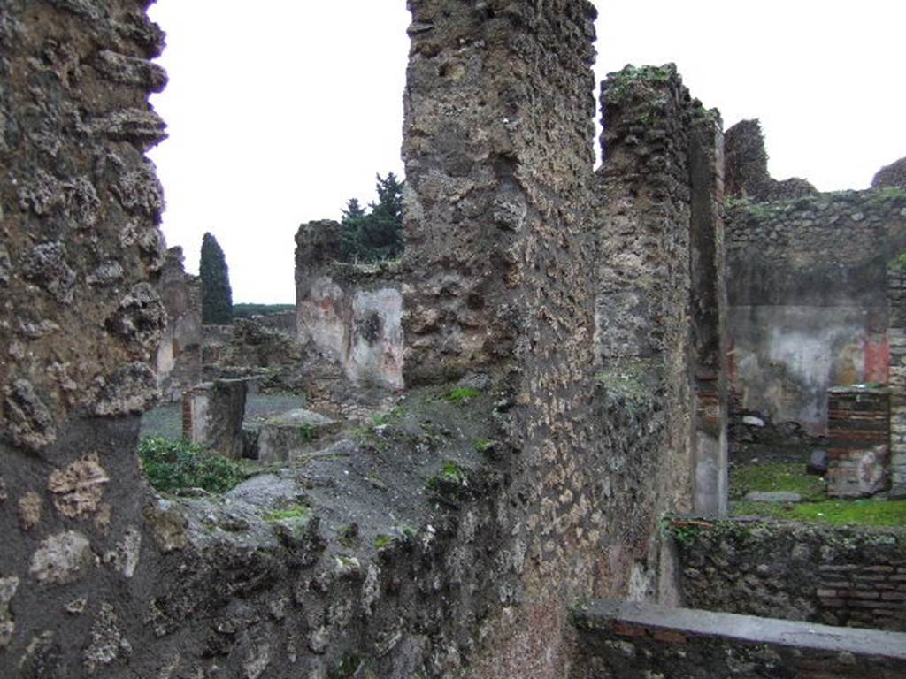 VII.14.17 Pompeii. December 2005. Looking east from entrance at east wall.