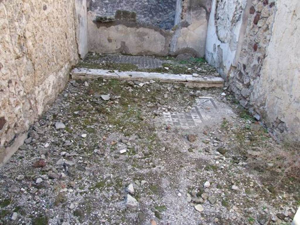 VII.15.2 Pompeii. December 2007. Bedroom on west side of Atrium with bed platform.