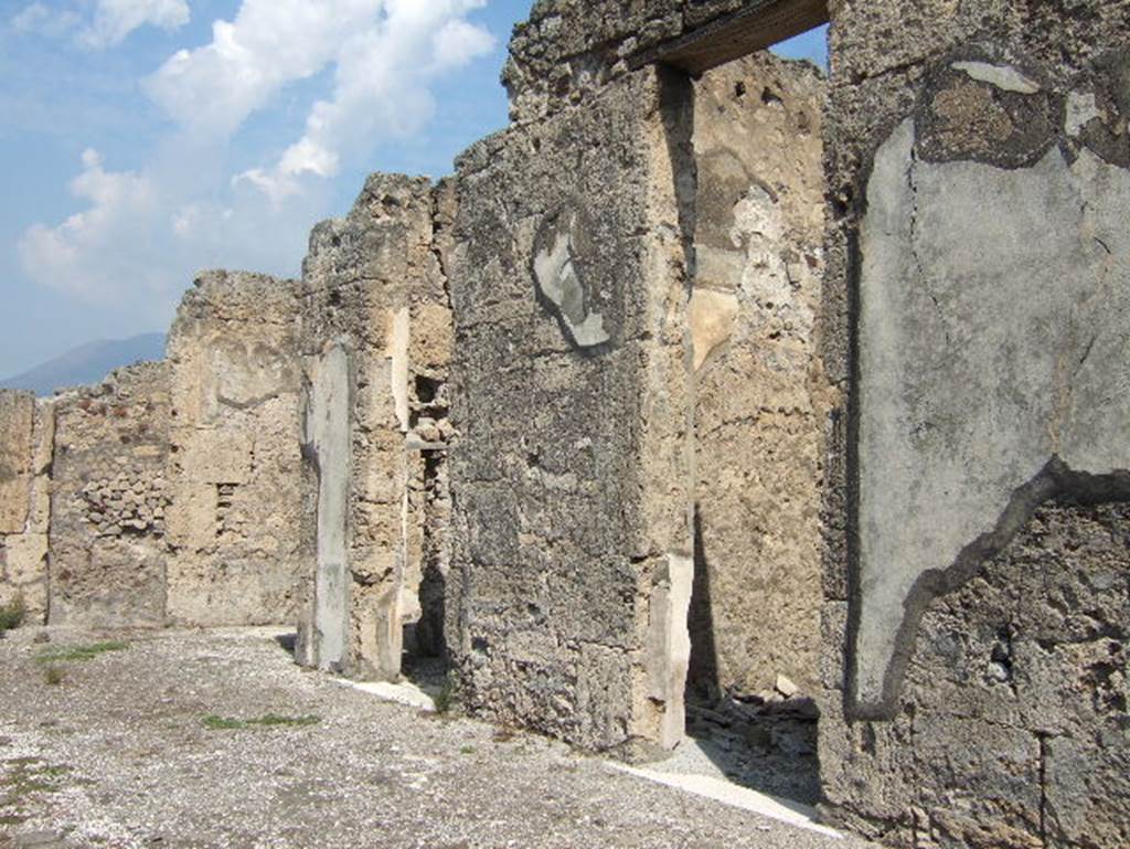 VII.15.2 Pompeii. September 2005. Doorways on east side of Atrium looking north.